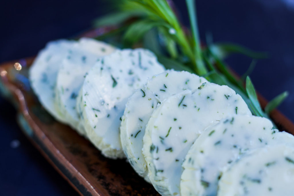 tarragon compound butter on serving tray