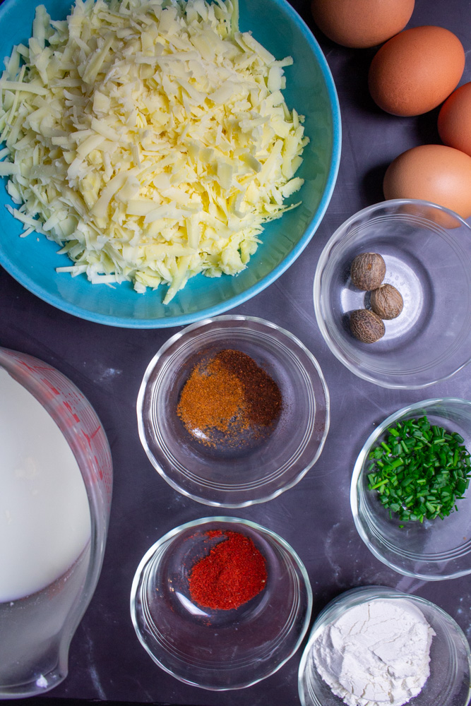 egg souffle ingredients: spices, cheese, milk, herbs, and flour