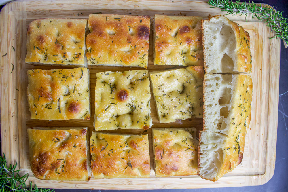 rosemary sourdough focaccia on cutting board