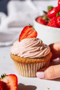 strawberry cupcakes with strawberry cream cheese icing and strawberry core