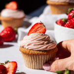 strawberry cupcakes with strawberry cream cheese icing and strawberry core