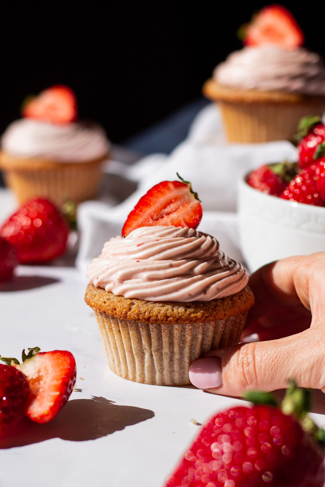 strawberry cupcakes with strawberry cream cheese icing and strawberry core