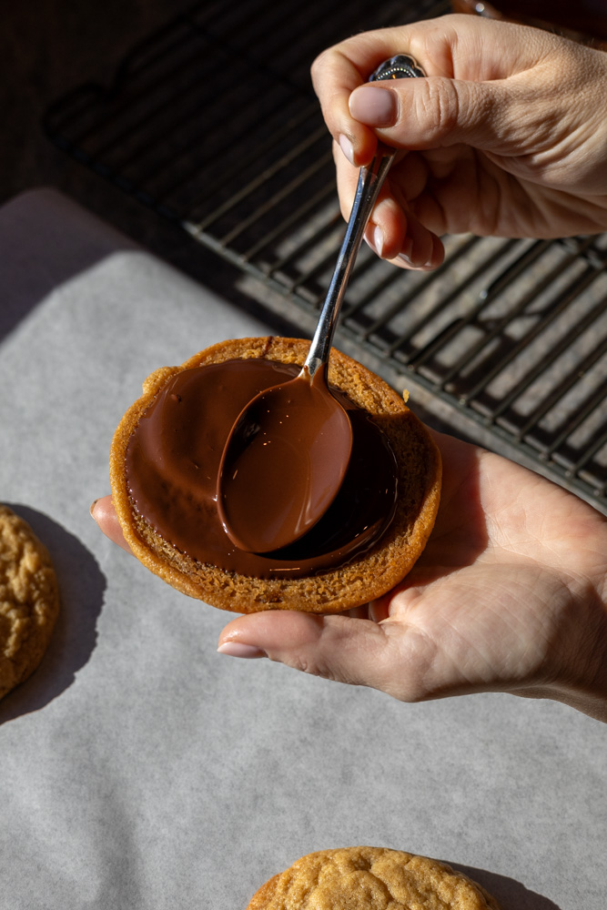 Melted chocolate on peanut butter cookies