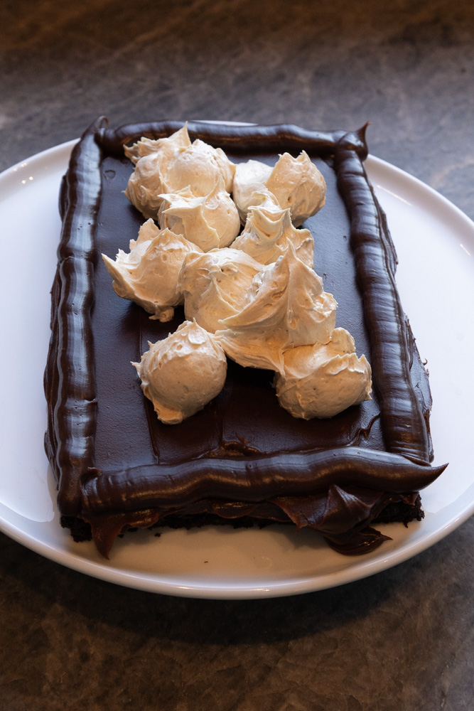 Layering the Fudgy Chocolate Peanut Butter Cake